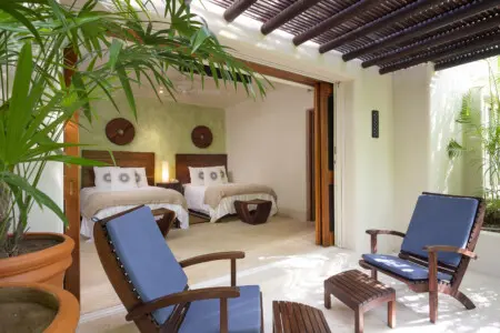 Bedroom with lounge chairs